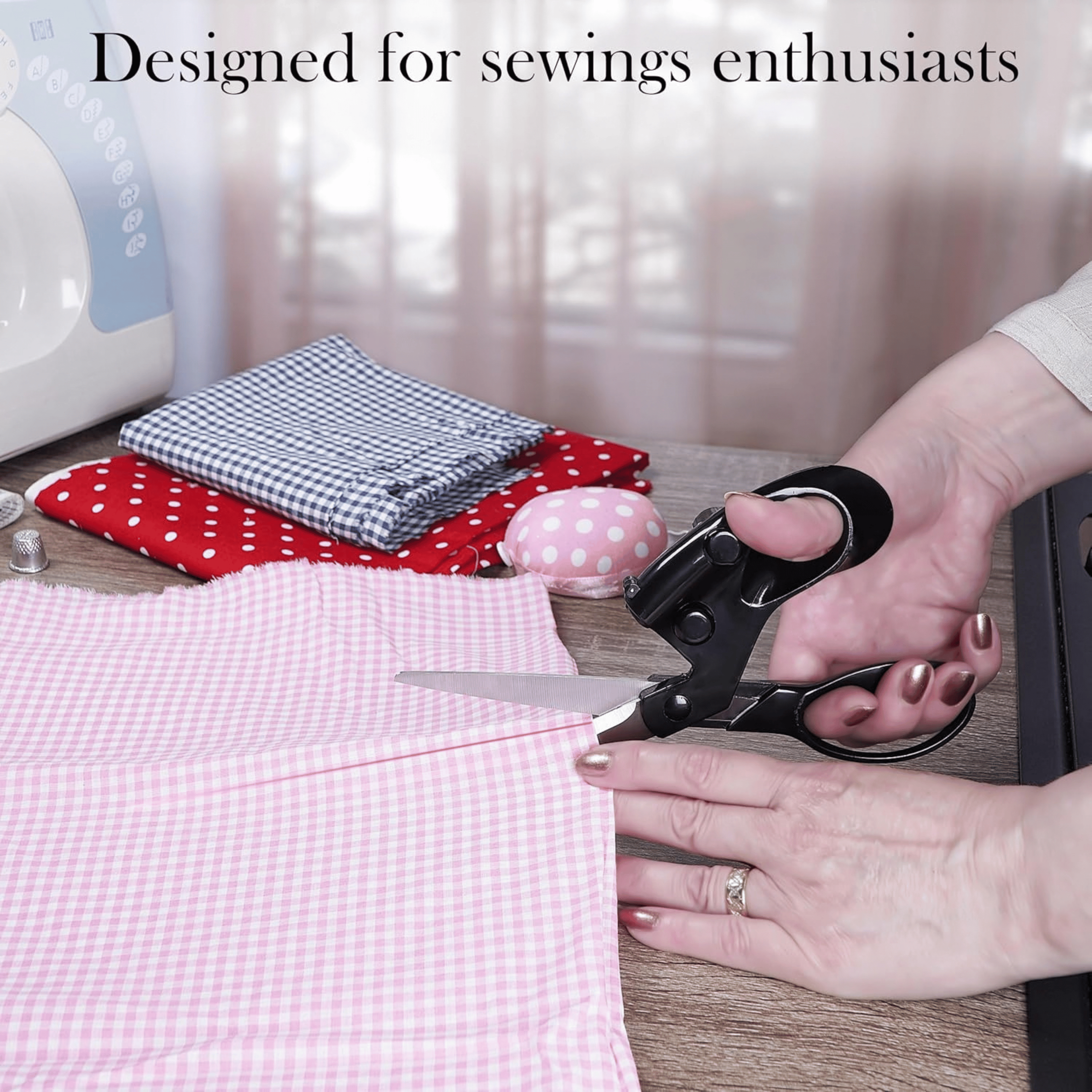 Cutting pink fabric with Dymane scissors for a sewing project